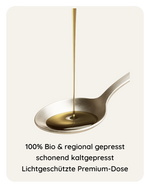 Bio Walnussöl tropft in Löffel – 100 % Bio, regional gepresst, kaltgepresst und lichtgeschützt